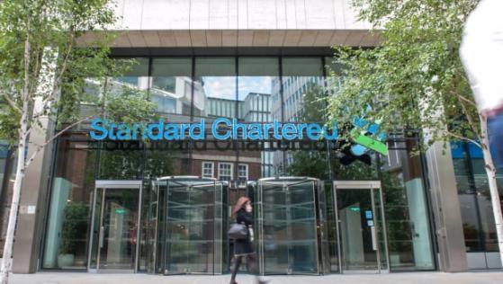 Standard Chartered Q3 profit dented by China exposure